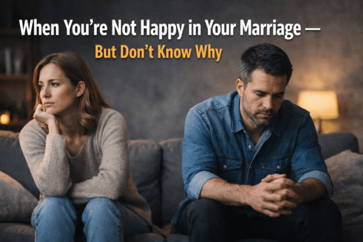 Couple sitting apart on couch feeling emotionally disconnected and unhappy in marriage